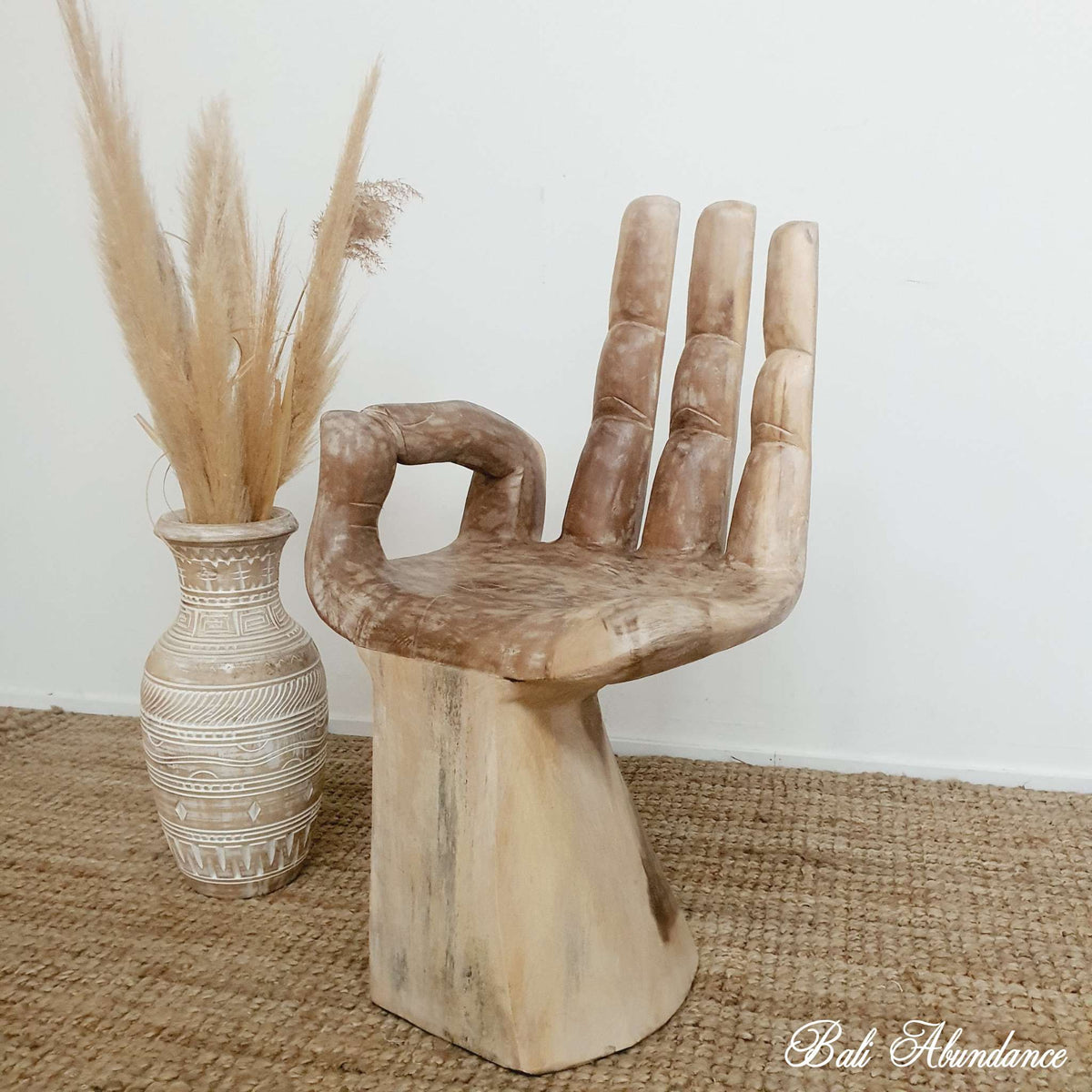 Balinese hand deals chair