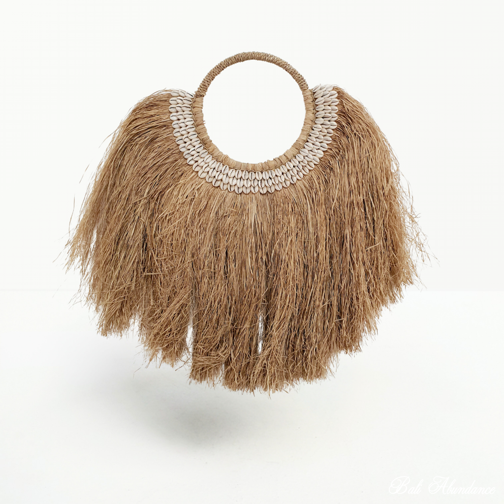 raffia and shell wall hanging